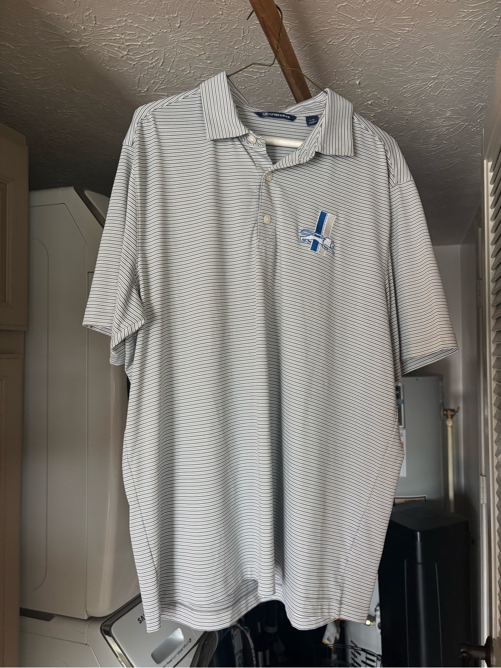 Cutter & Buck White Polo with Thin Gray Stripes and Blue Logo